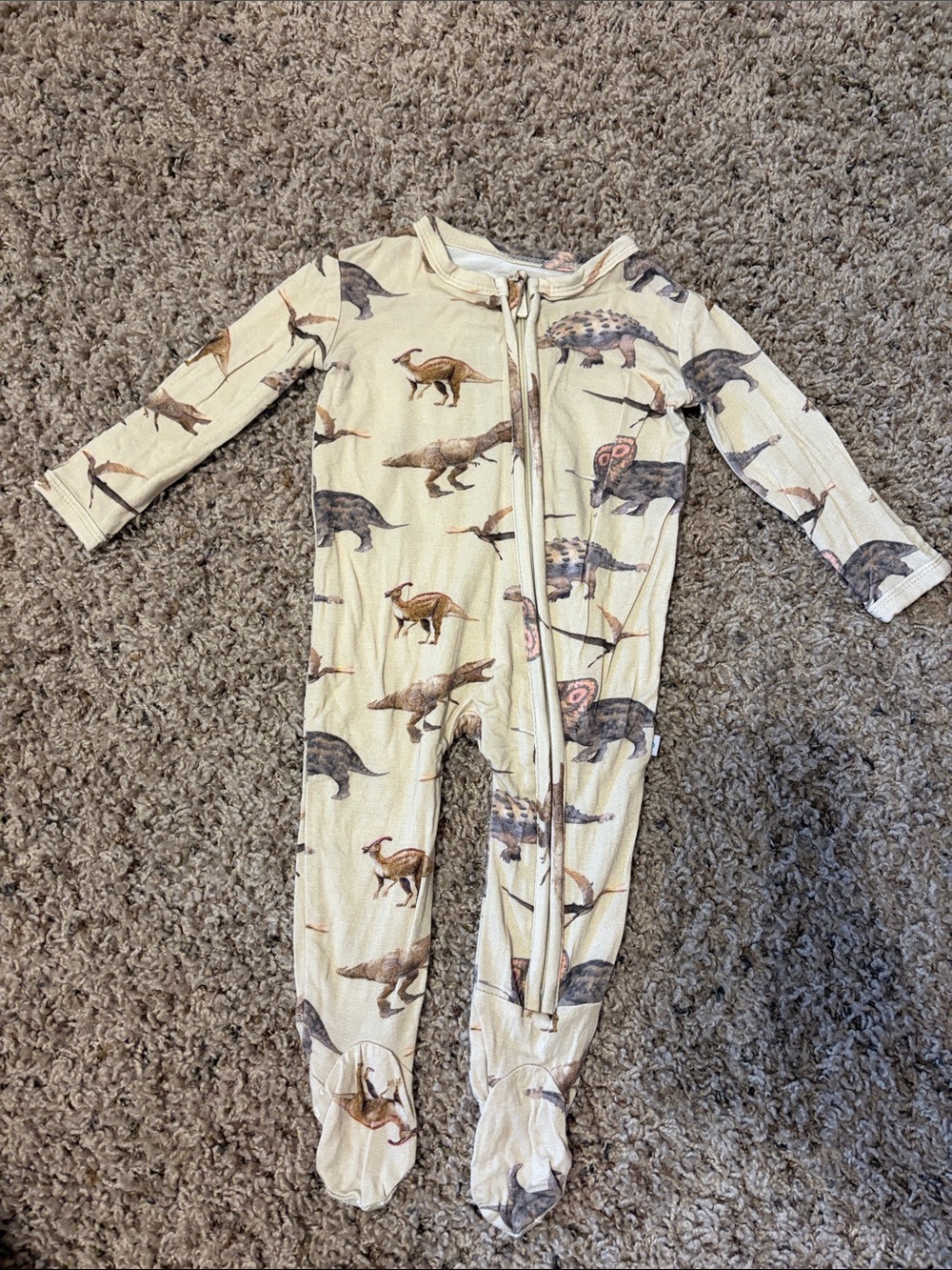 Posh Peanut Cream Dinosaur Print Footed One-Piece